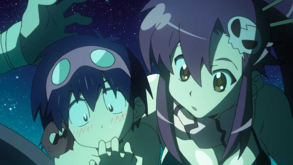 Simon and Yoko look at a glowing object