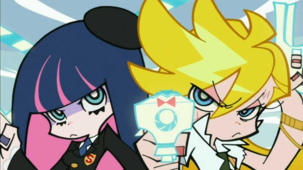 Panty points her gun towards the camera and Stocking stands beside her